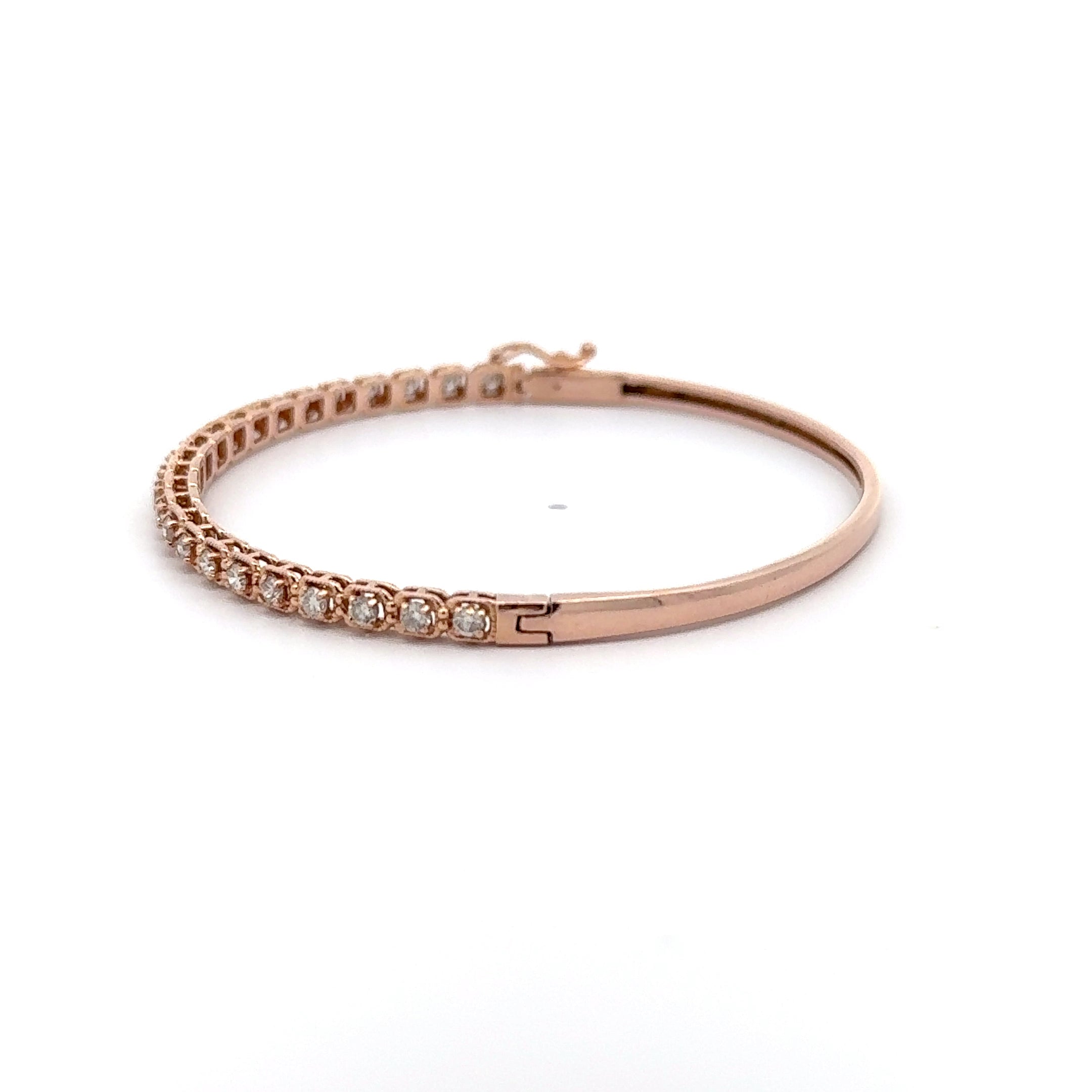 14 KARAT ROSE GOLD AND DIAMOND HINGED BRACELET