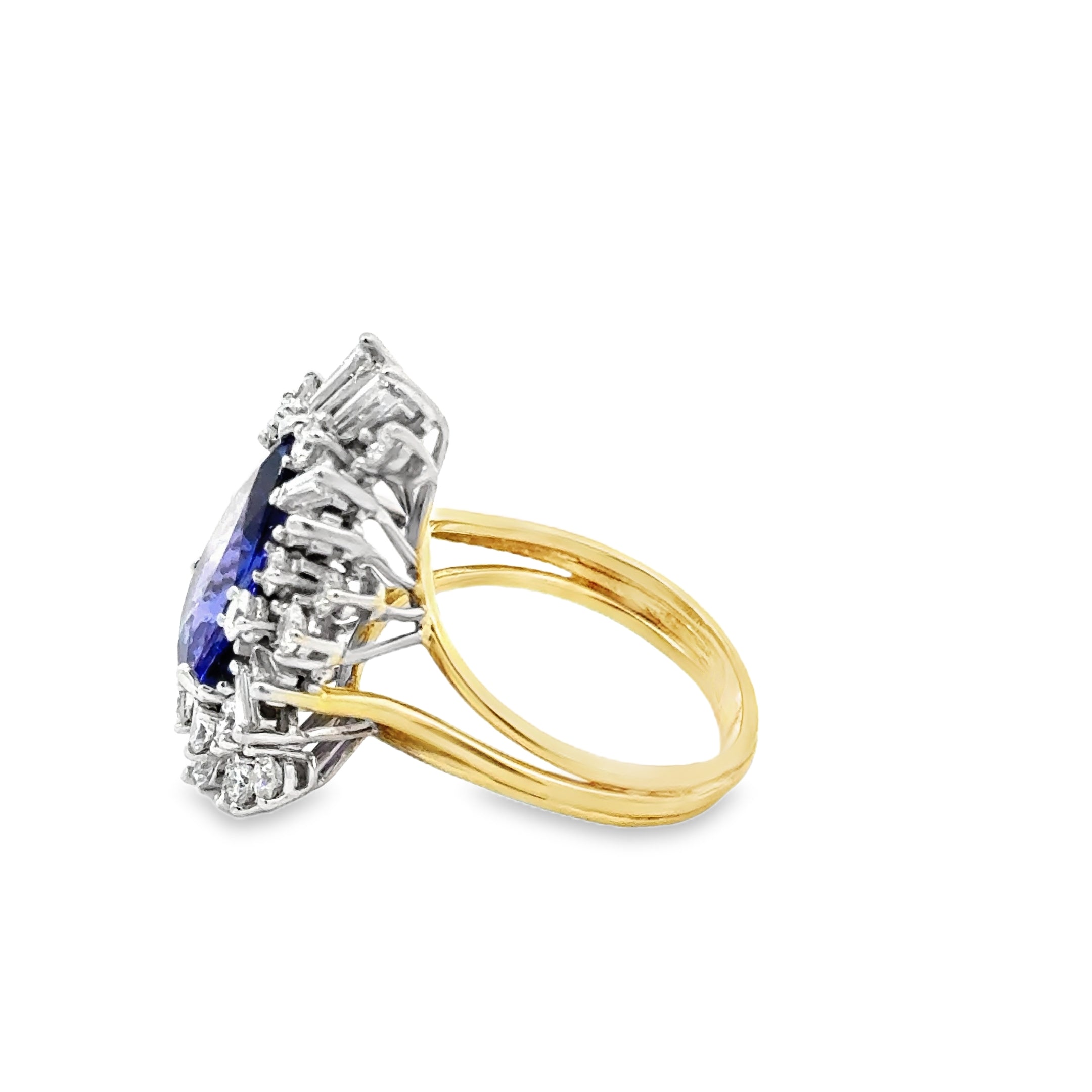 18 KARAT TANZANITE AND DIAMOND RING
