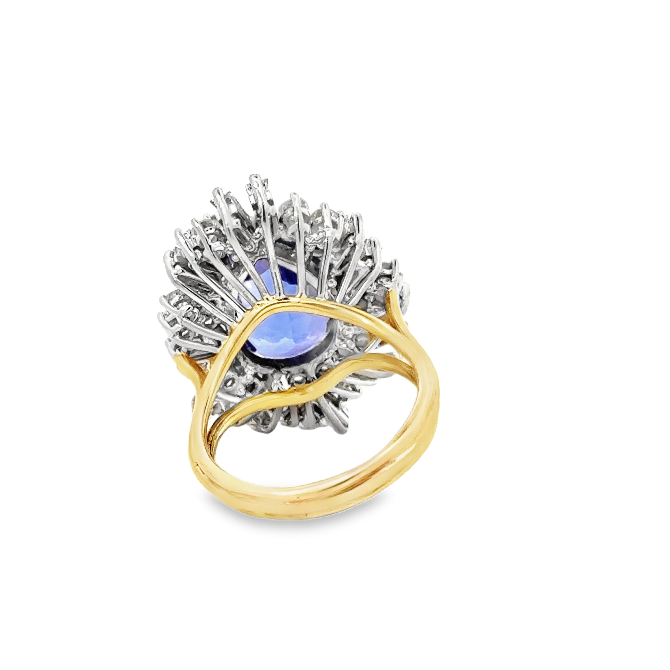 18 KARAT TANZANITE AND DIAMOND RING