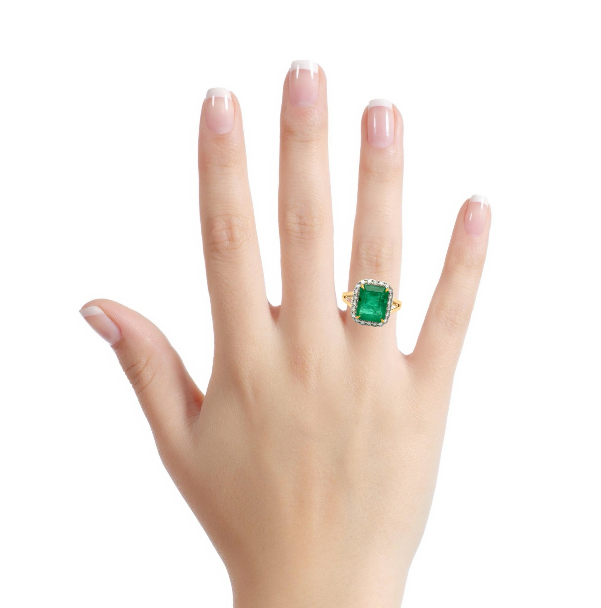18 KARAT EMERALD AND DIAMOND HALO RING