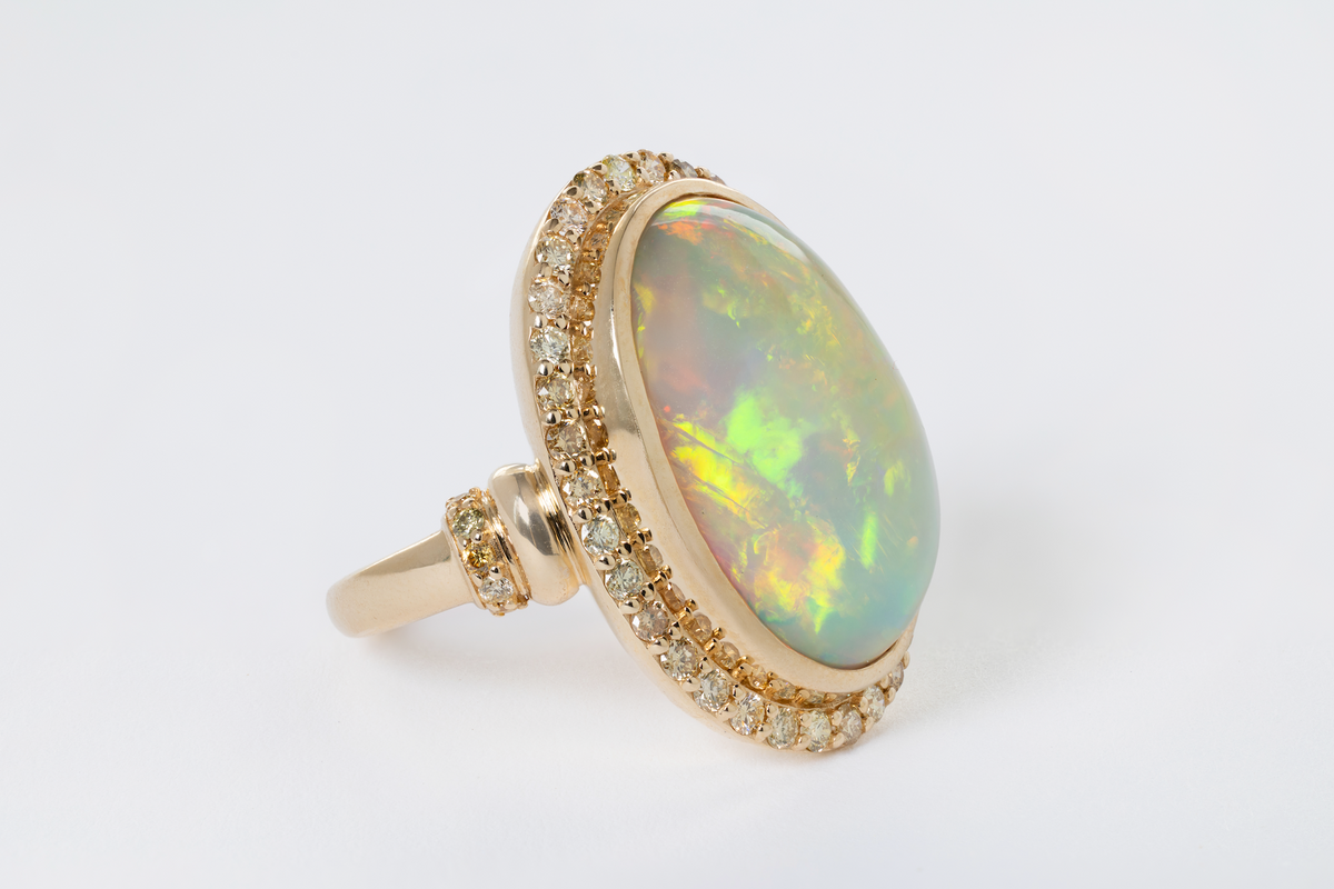 9.10 CARAT OPAL AND DIAMOND RING