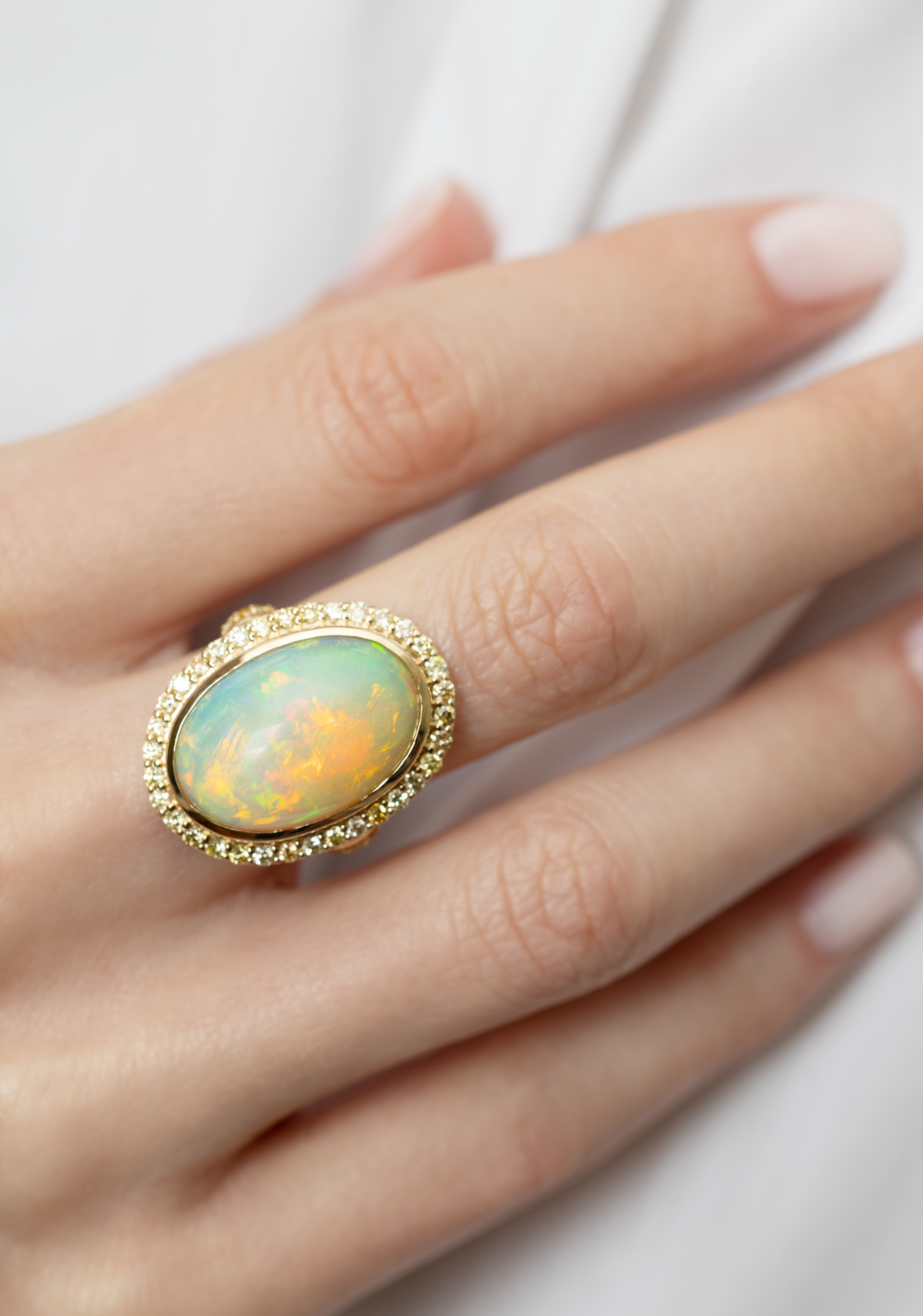 9.10 CARAT OPAL AND DIAMOND RING