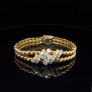 14 KARAT YELLOW GOLD AND DIAMOND BRACELET