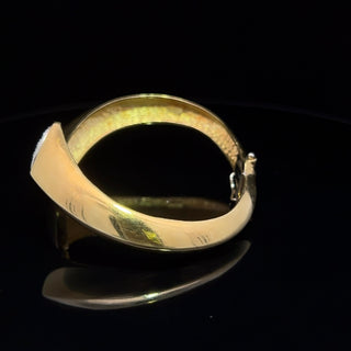 18 KARAT YELLOW GOLD AND DIAMOND BRACELET