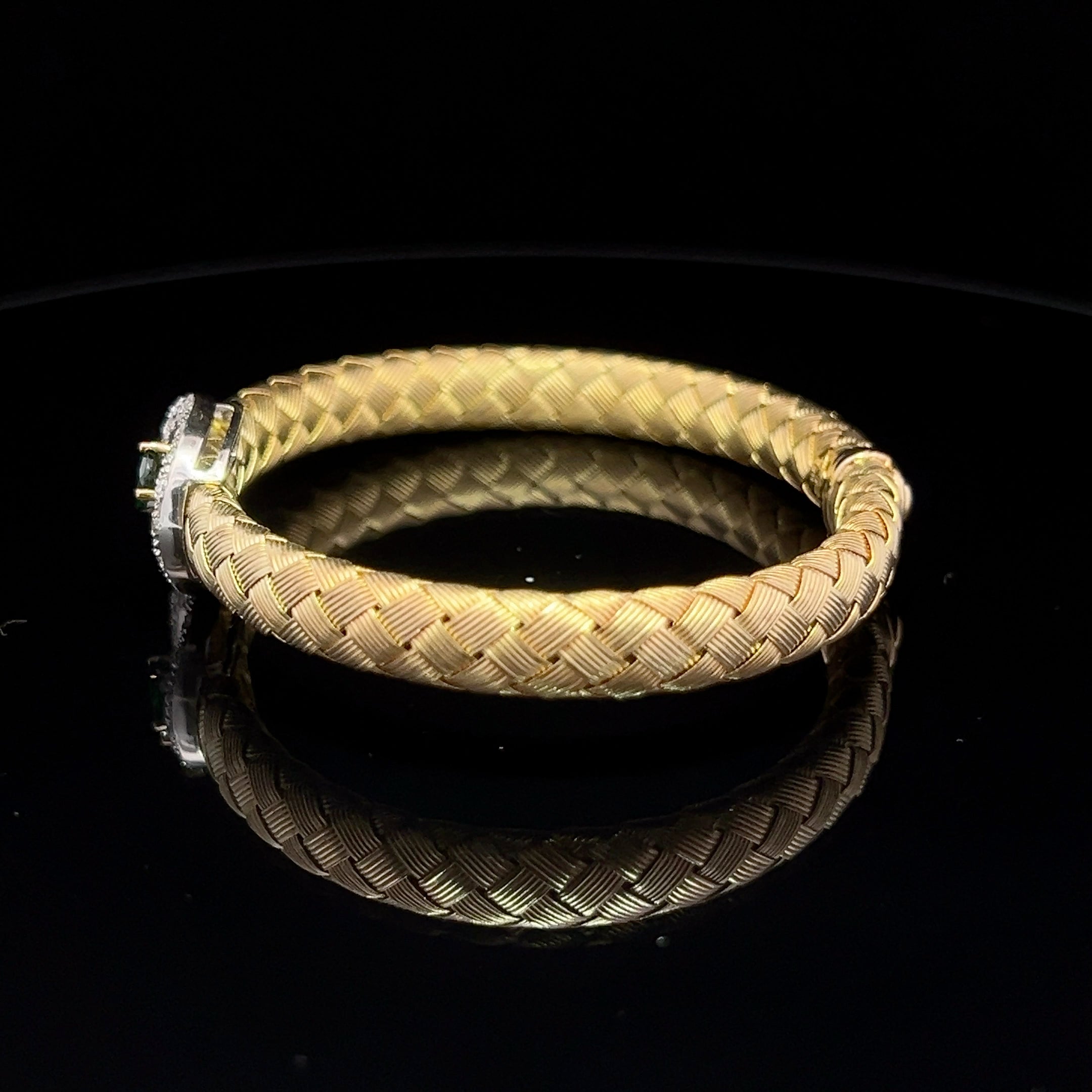 VINTAGE 14 KARAT BICOLOR YELLOW GOLD TSAVORITE AND DIAMOND BRACELET