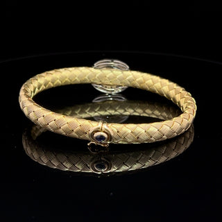 VINTAGE 14 KARAT BICOLOR YELLOW GOLD TSAVORITE AND DIAMOND BRACELET