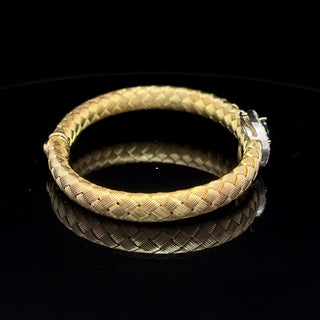 VINTAGE 14 KARAT BICOLOR YELLOW GOLD TSAVORITE AND DIAMOND BRACELET