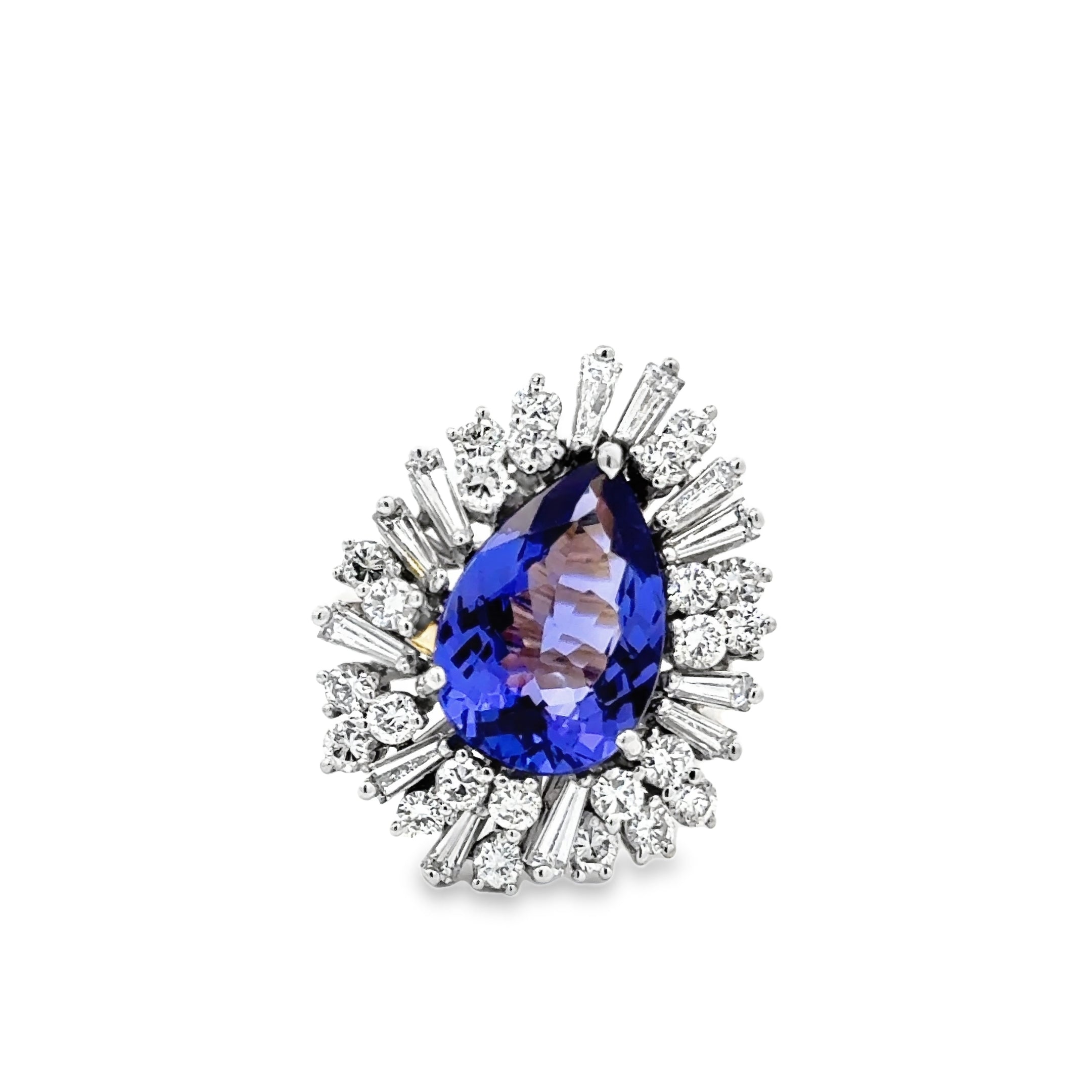 18 KARAT TANZANITE AND DIAMOND RING