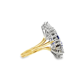 18 KARAT TANZANITE AND DIAMOND RING