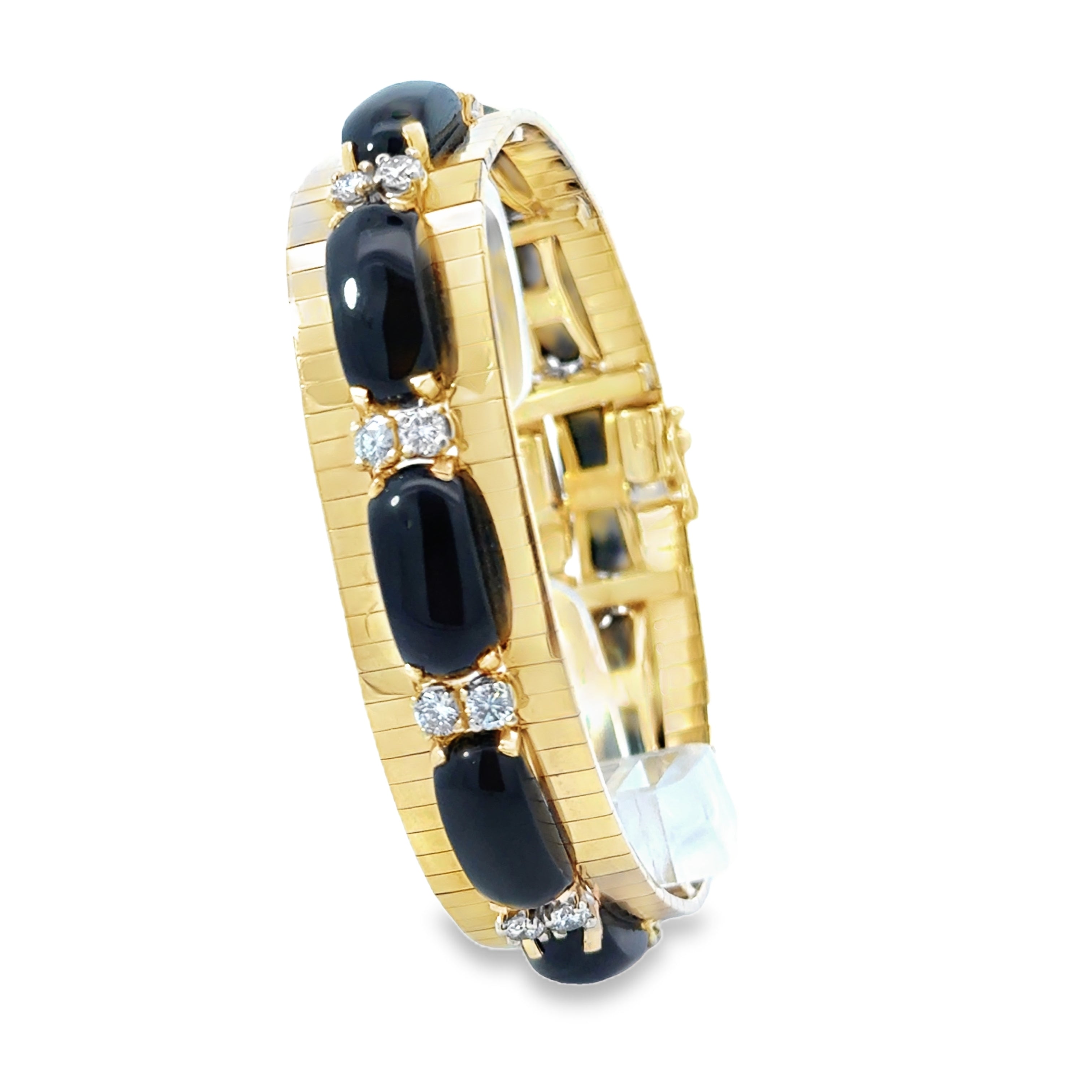 14 KARAT YELLOW VINTAGE GOLD DIAMOND AND ONYX BRACELET