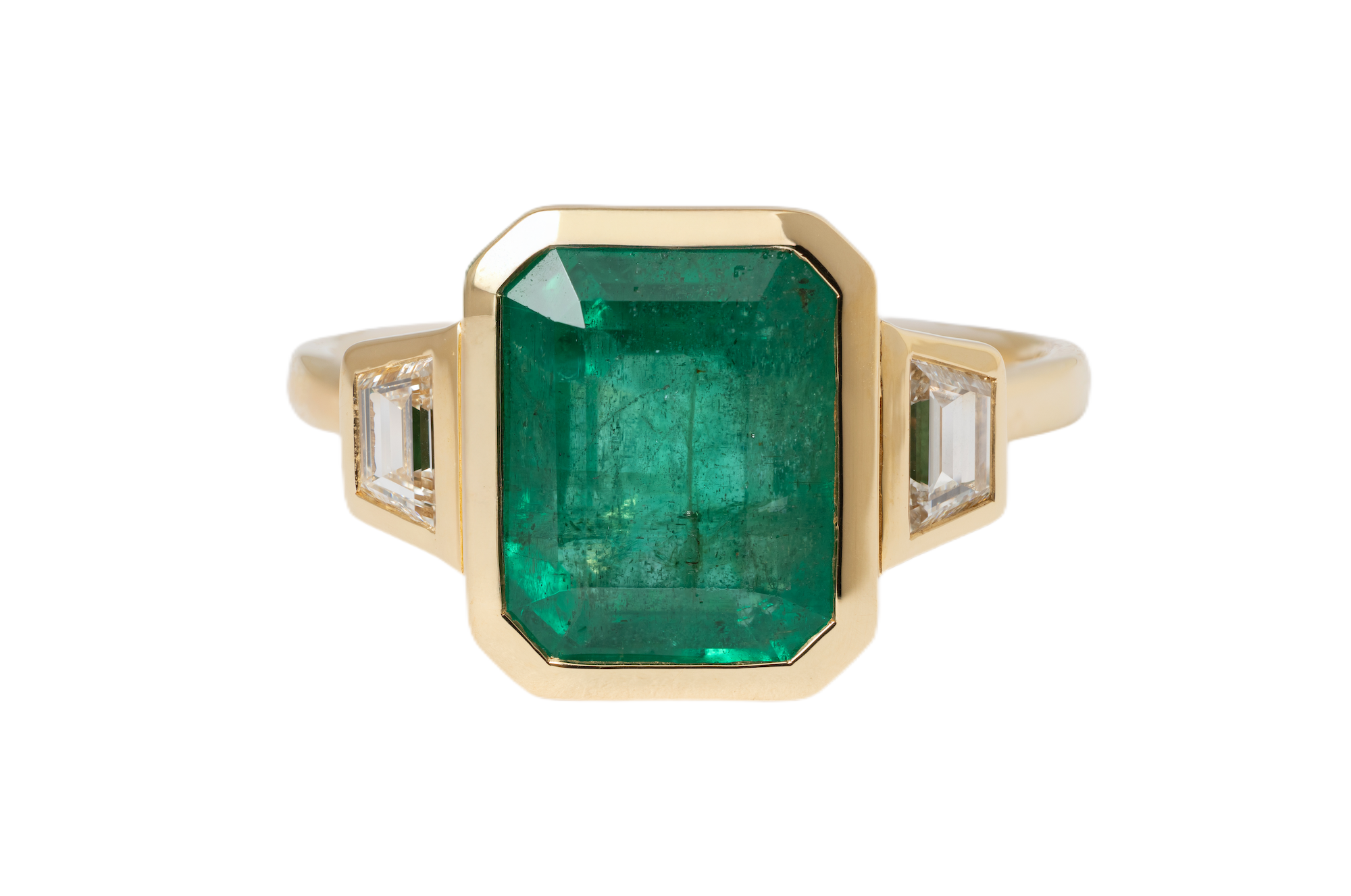 4.10 CARAT EMERALD AND DIAMOND THREE-STONE RING