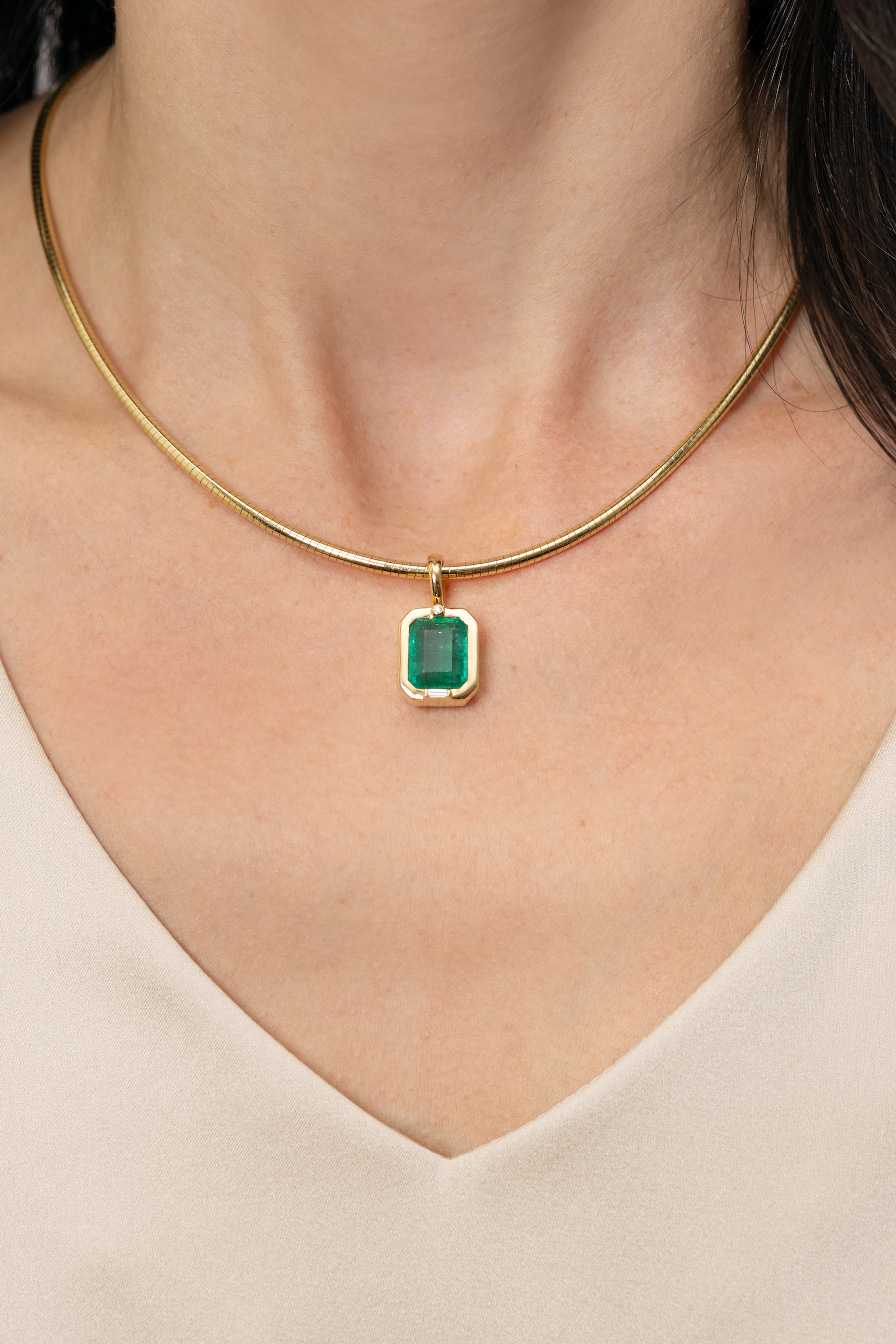 5.22 CARAT EMERALD AND DIAMOND BEZEL PENDANT