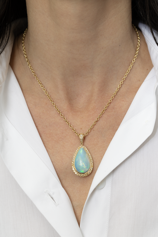 7.97 CARAT OPAL AND DIAMOND PENDANT